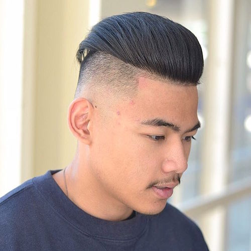 gregorymaxbarber slicked back high fade undercut