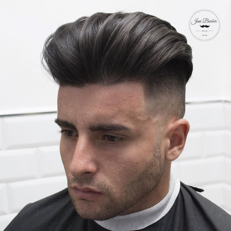 javi_thebarber__high fade and long hair slicked back dry
