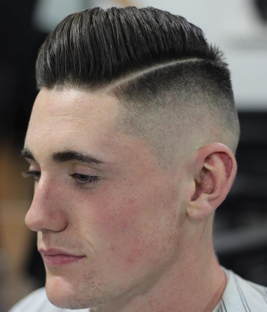 kieronthebarber_bald fade medium length pompadour