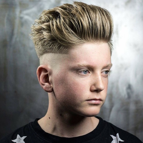 braidbarbers_and_Skin_fade_with_step._Top_slightly_texturised_to_maintain_height._Blow_dried