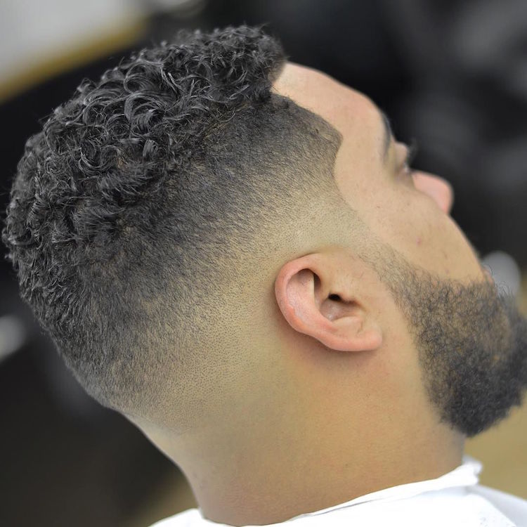 zeke_the_barber_and clean sharp fade with curls on top