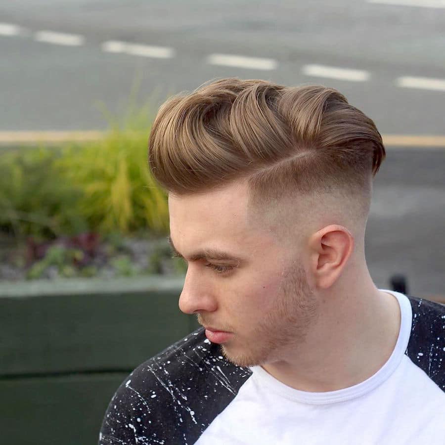 alan_beak_and mens haircut with half hard part thick hair on top