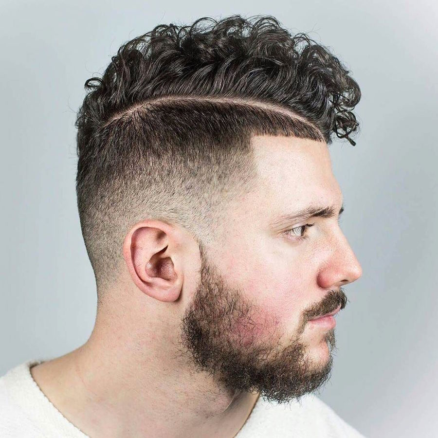 beholdthybarber_and high fade hardpart curls and volume on top