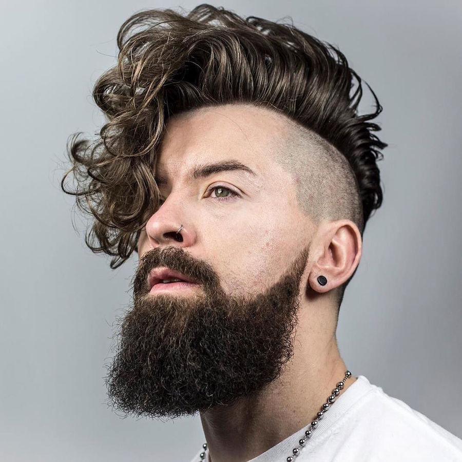 braidbarbers_and zero fade with undercut both sides long curly fringe