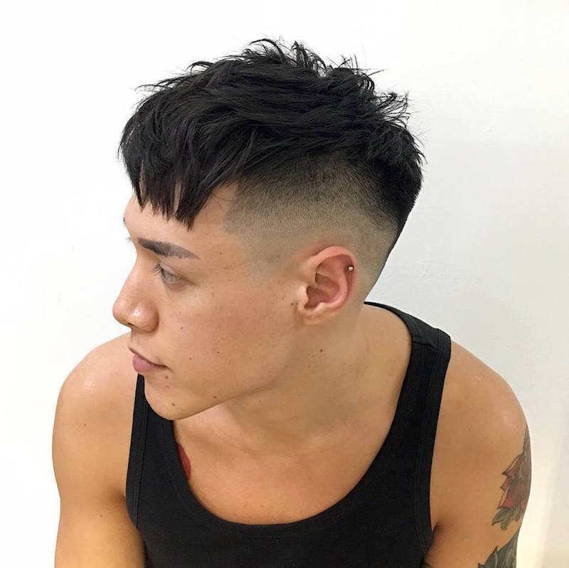 barber_djirlauw_and__Razor faded undercut chopped and sliced top with a diagonal straight fringe popular hairstyle men