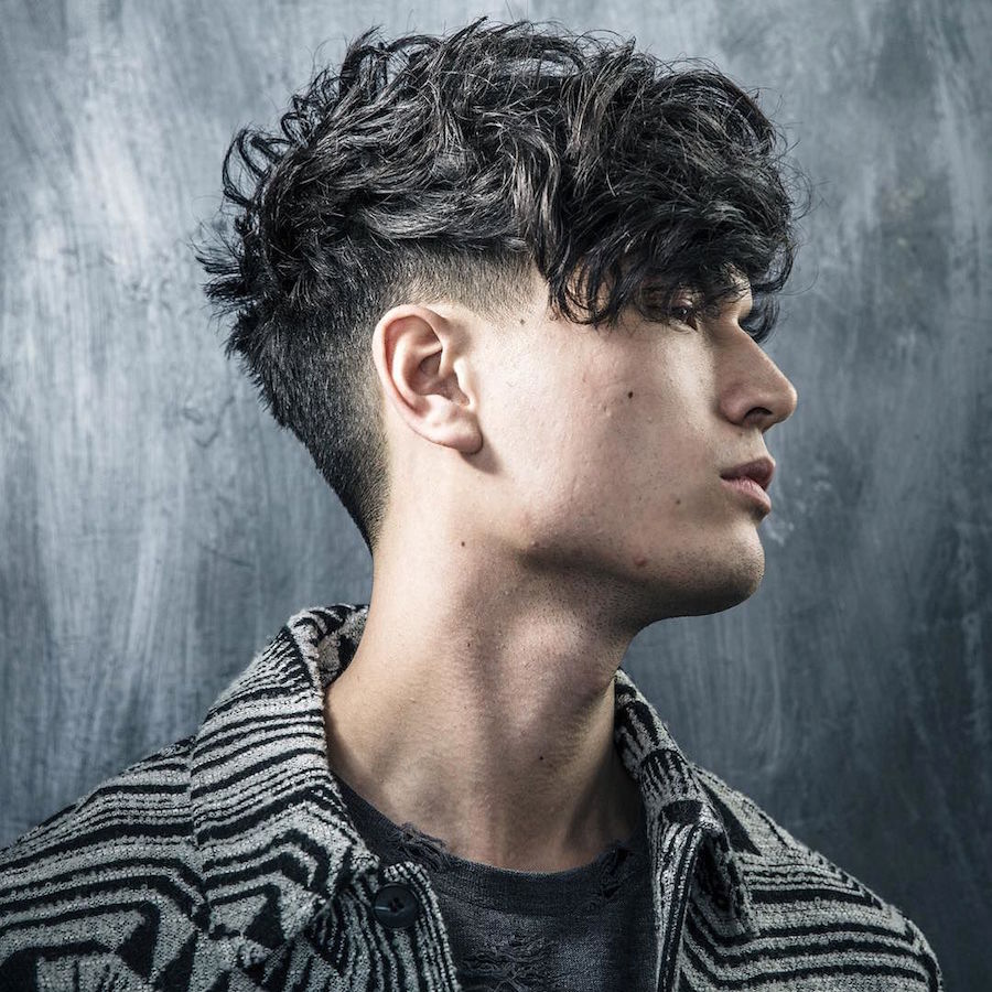 braidbarbers_and long textured messy crop with heavy fringe swept to the side