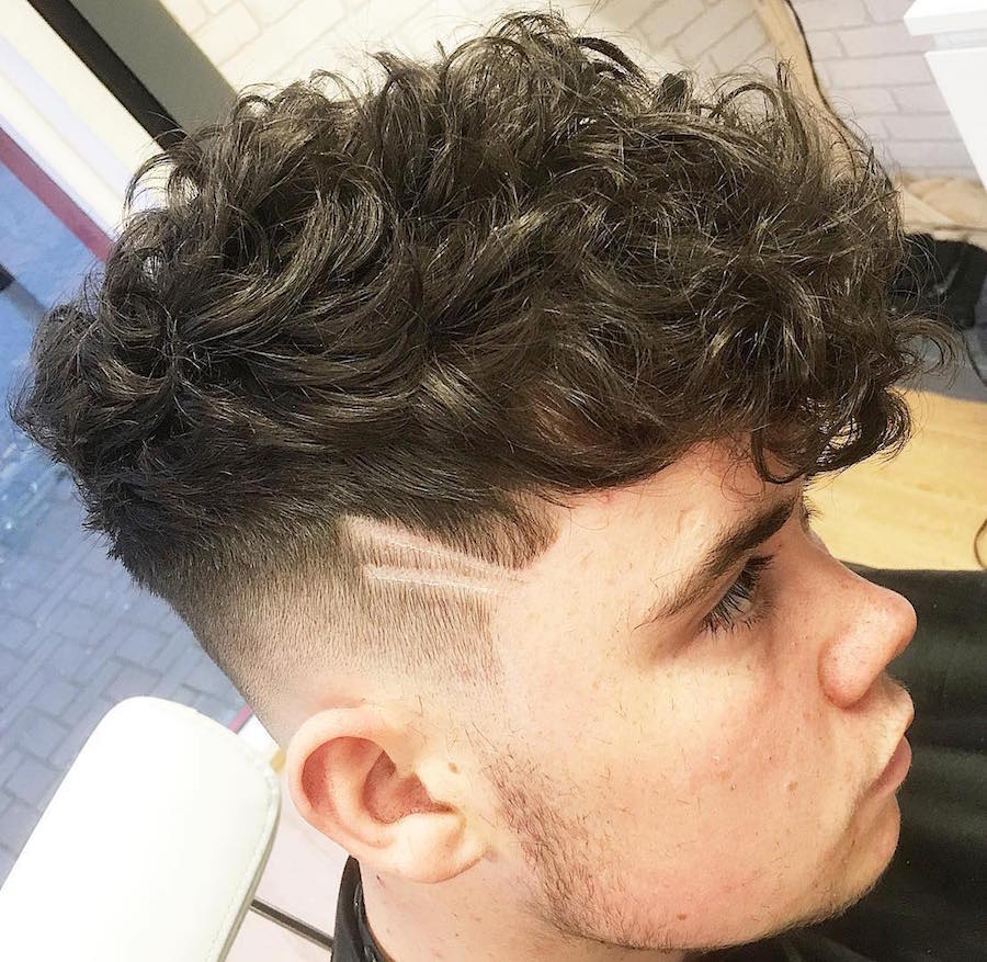 charliegray248_and low skin fade x ray design long curly hairstyle for men