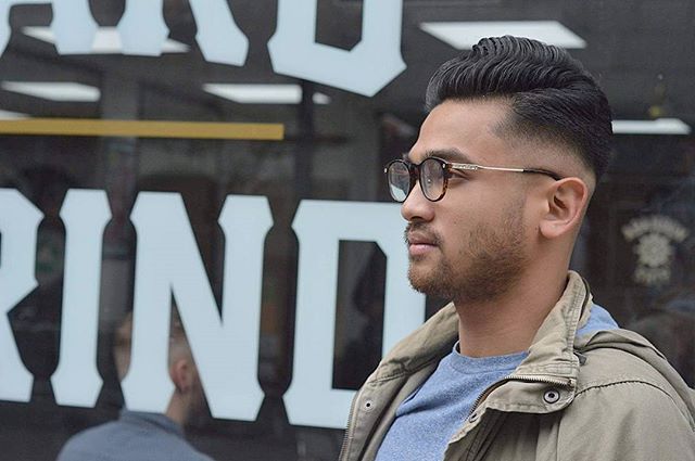 Mid to low fade thick wavy cool hairstyle for men