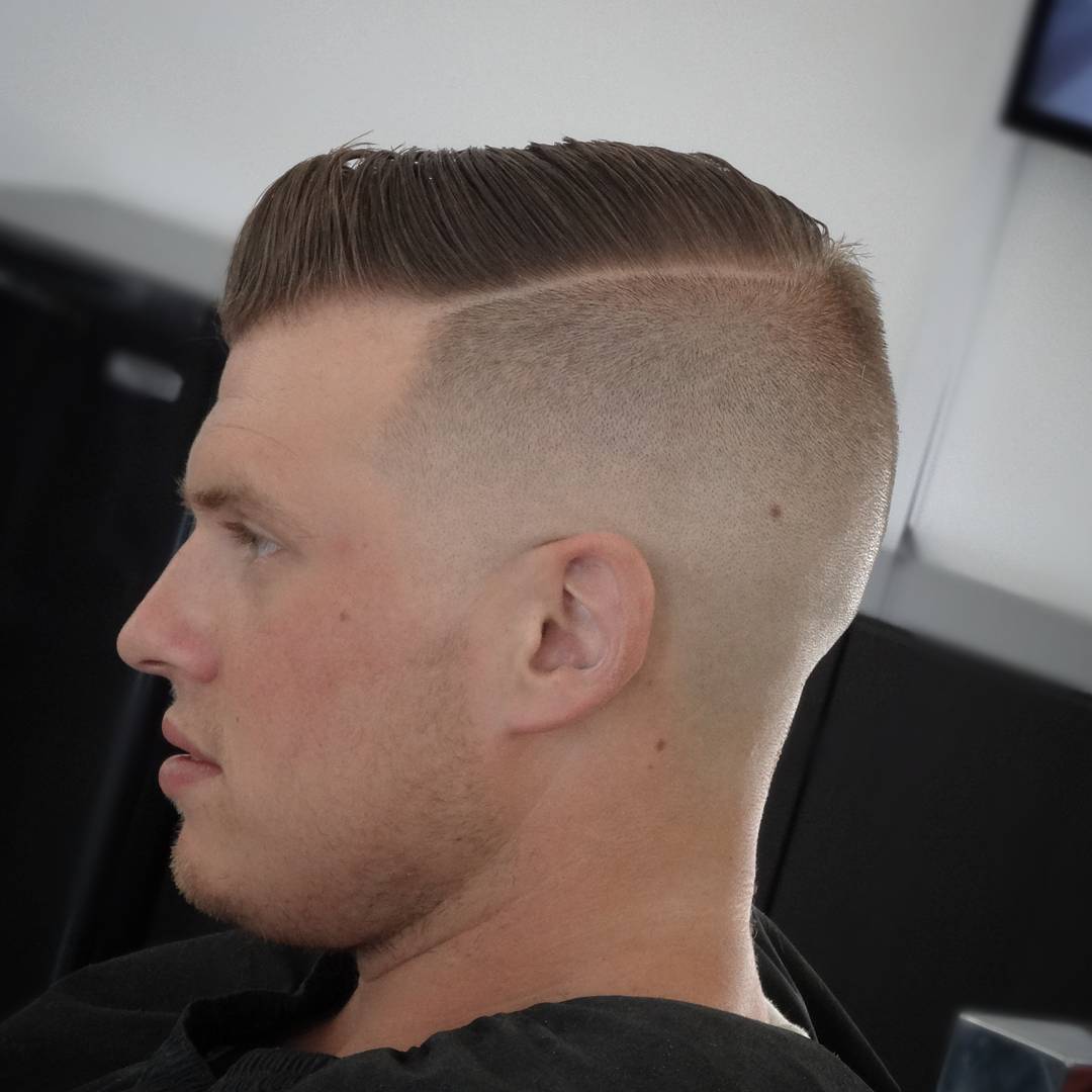 Men's short hair undercut with bald fade