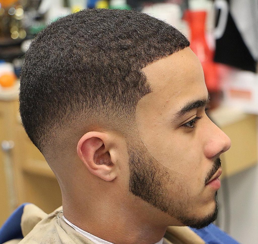 17. Buzz Cut For Natural Curls + Low Drop Fade.