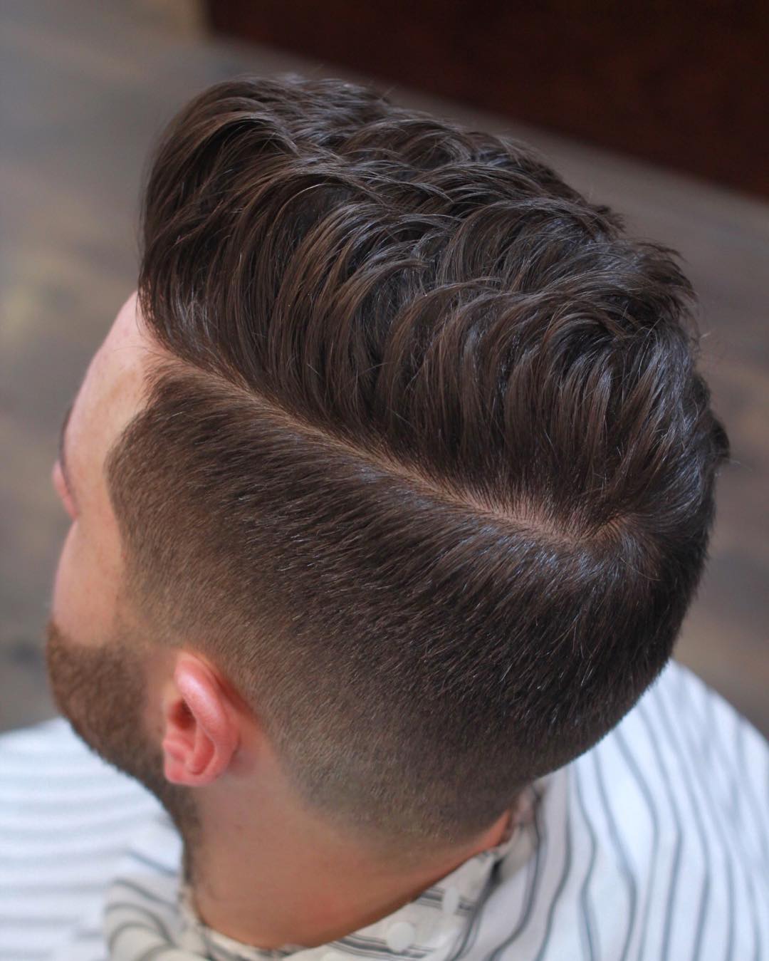 thegentlemanbarbers mid fade medium length hairstyle men