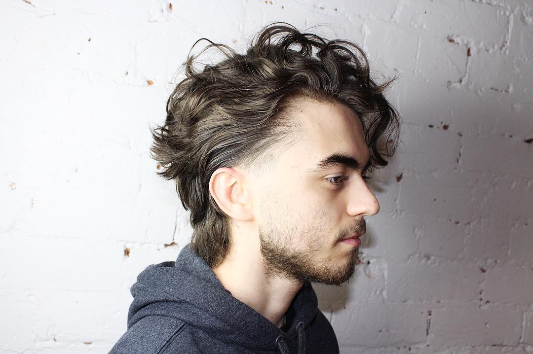 Mens hairstyle for long curly hair