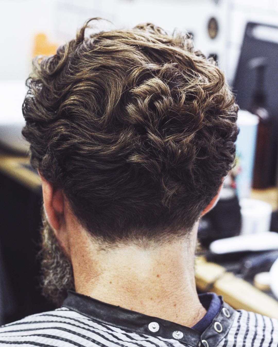 15 Best Curly Hair Haircuts + Hairstyles For Men