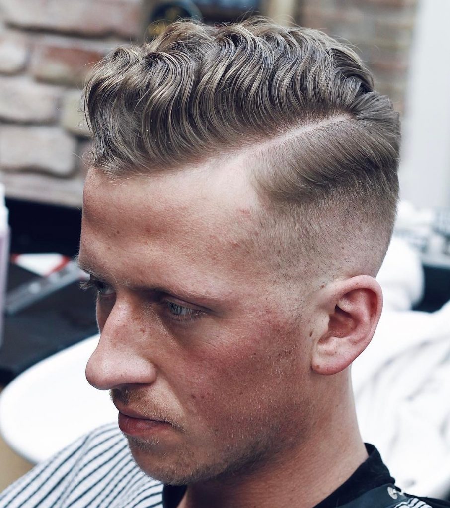 Image of Pompadour haircut with side parting for short hair male