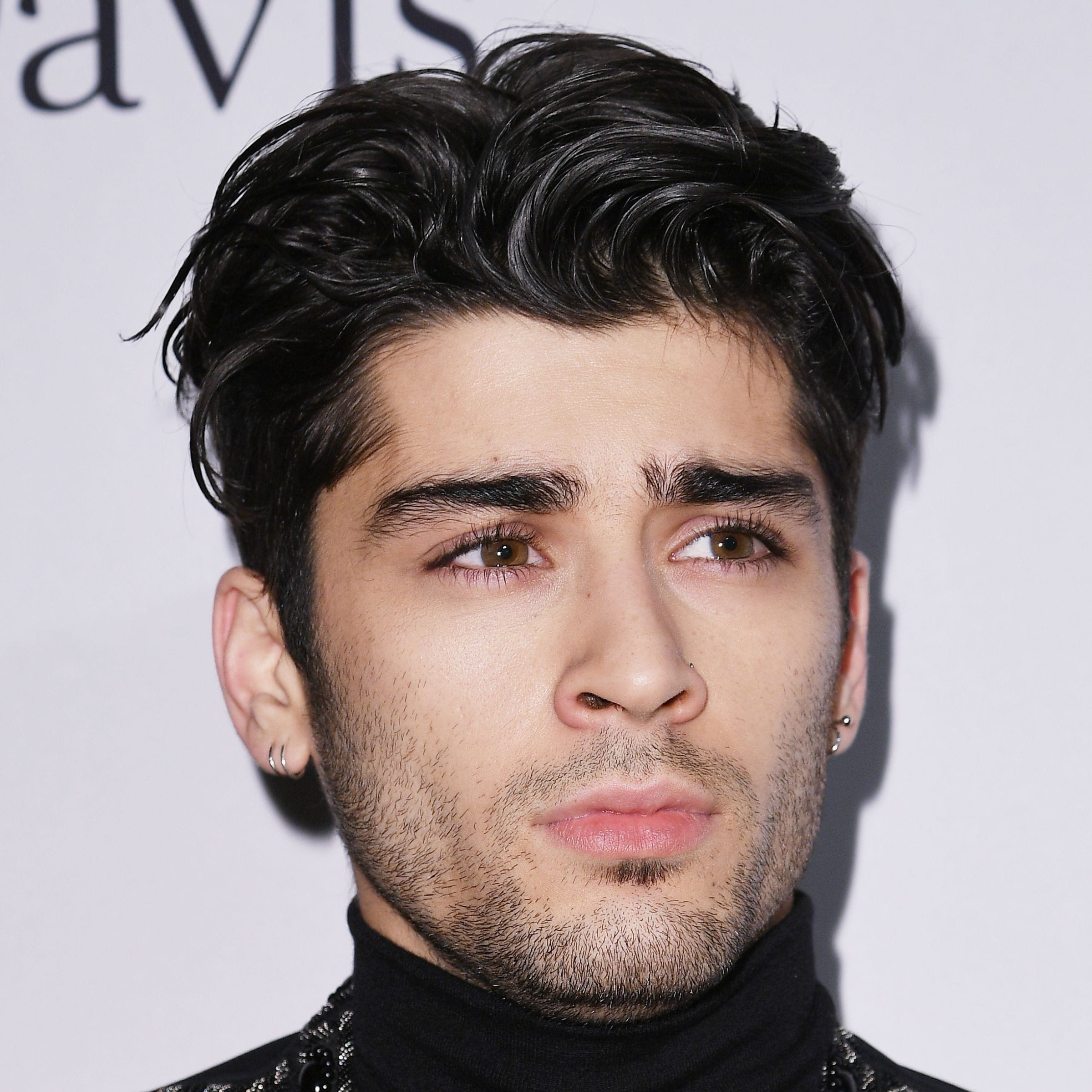 Zayn Malik Medium Length Hair Messy Style Kevork DjansezianGetty Images E1497454822311jpg