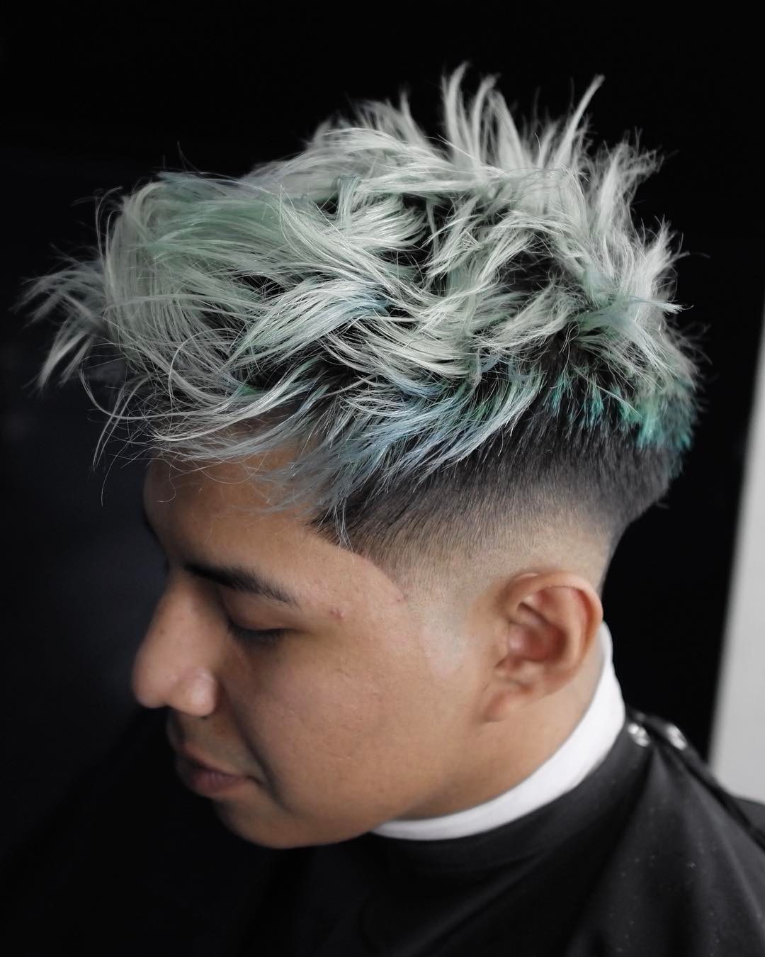 Messy textured hairstyle for men