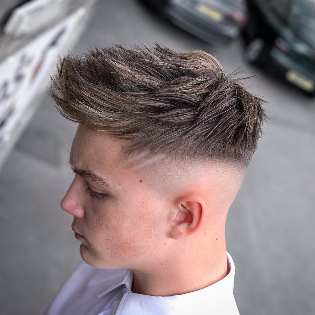 thick spiky boys haircut high skin fade