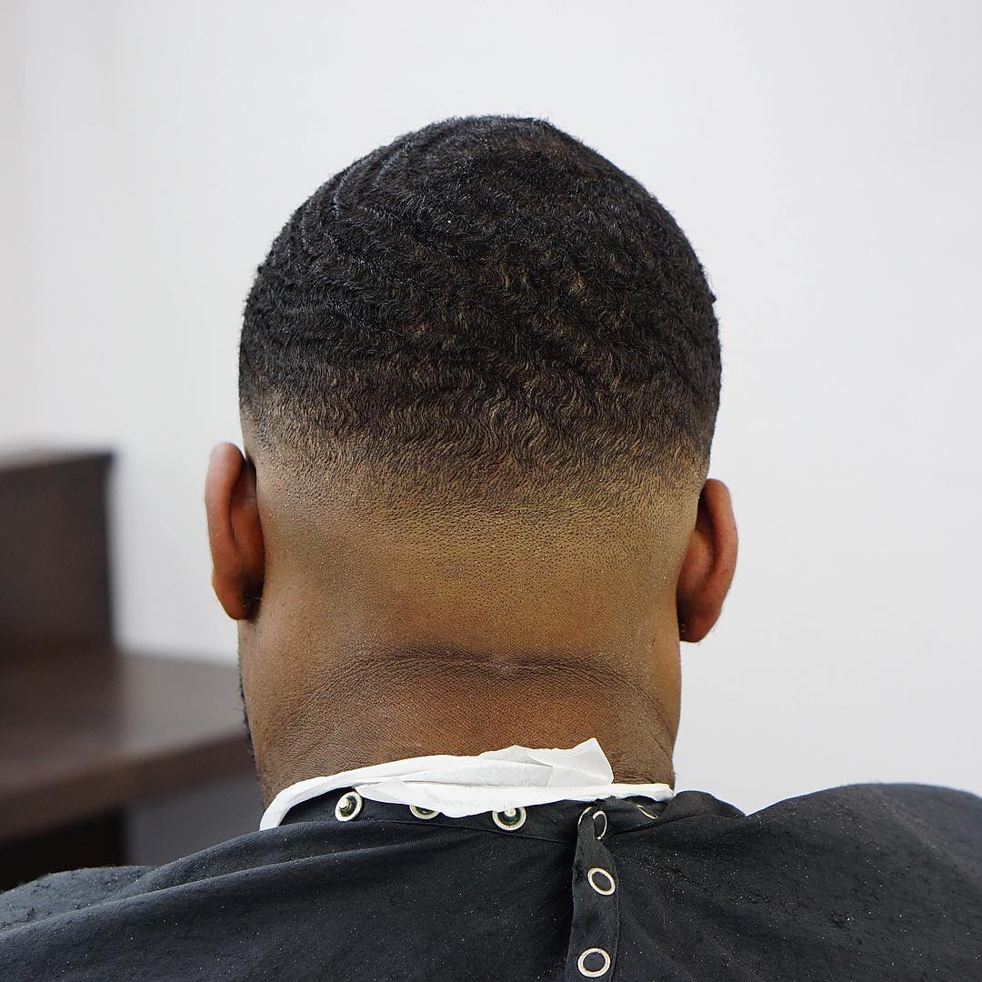 criztofferson killer waves bald fade haircut back