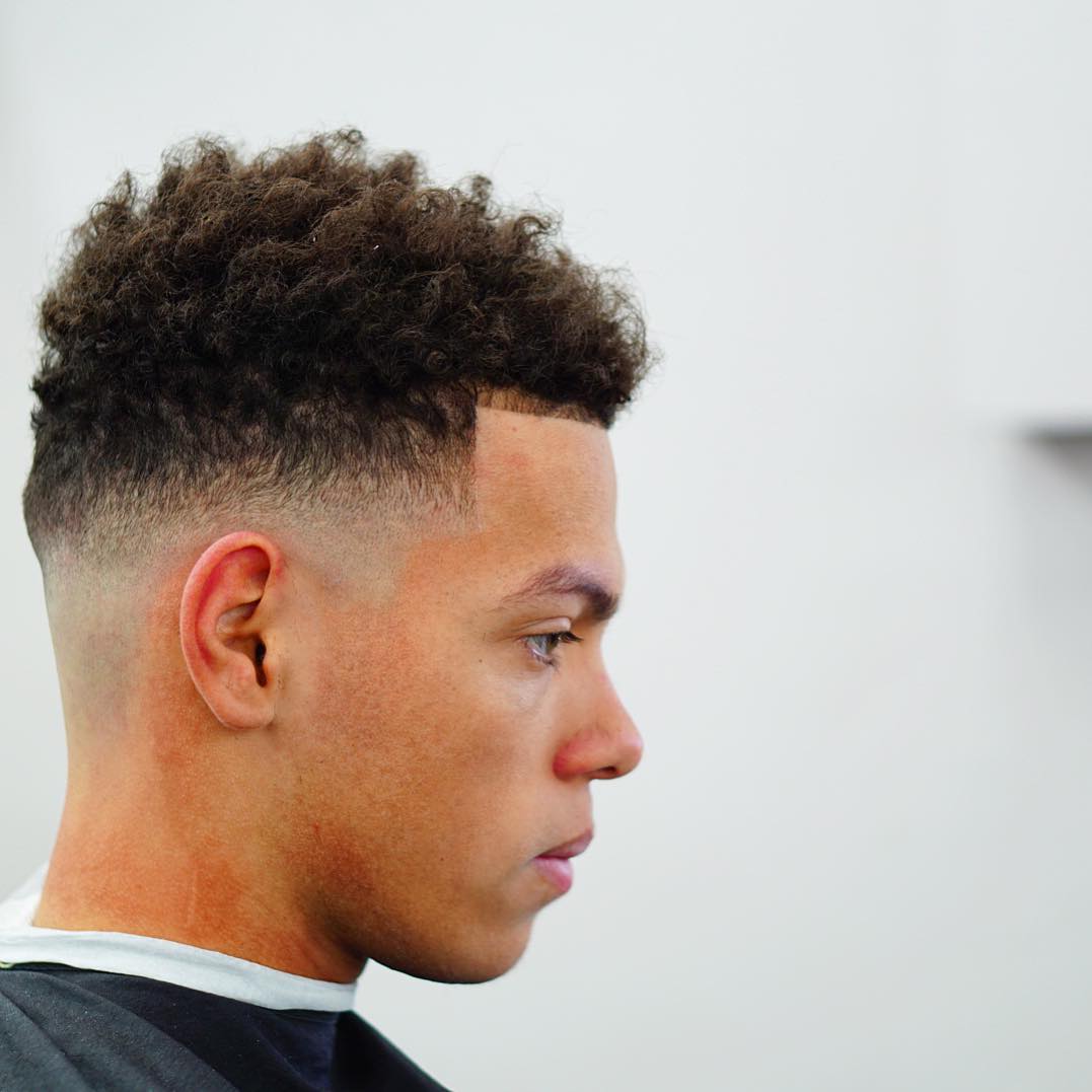 criztofferson natural curls bald fade haircut for men