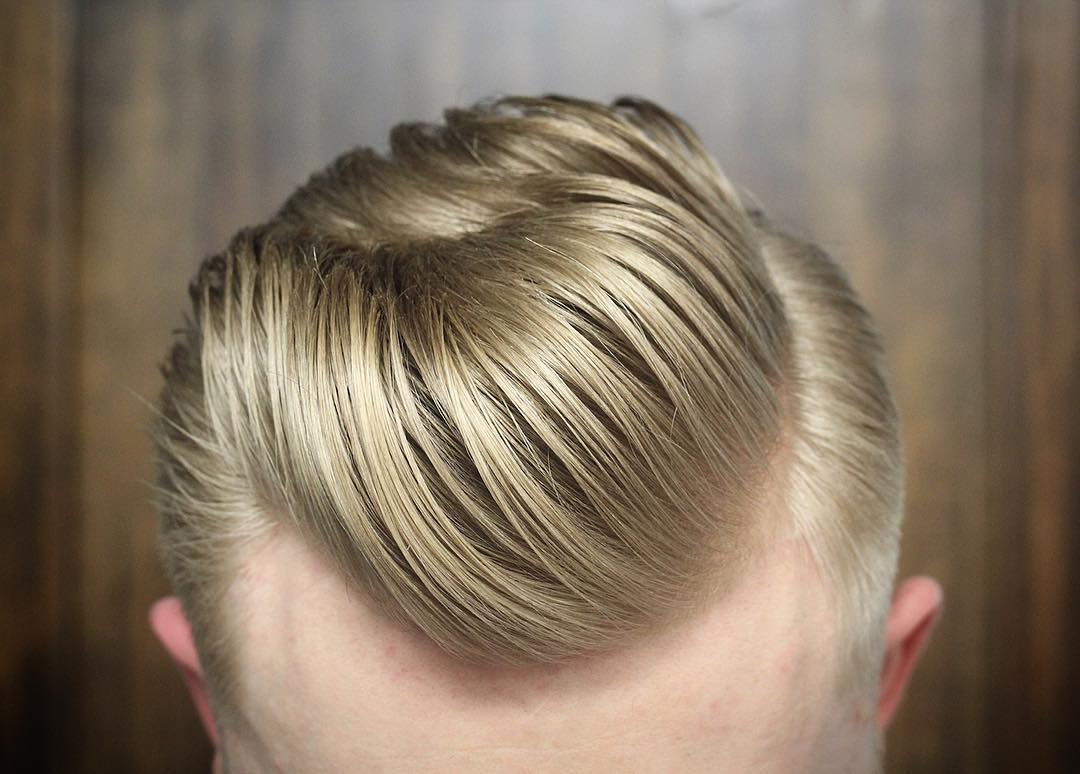 Side part pompadour haircut