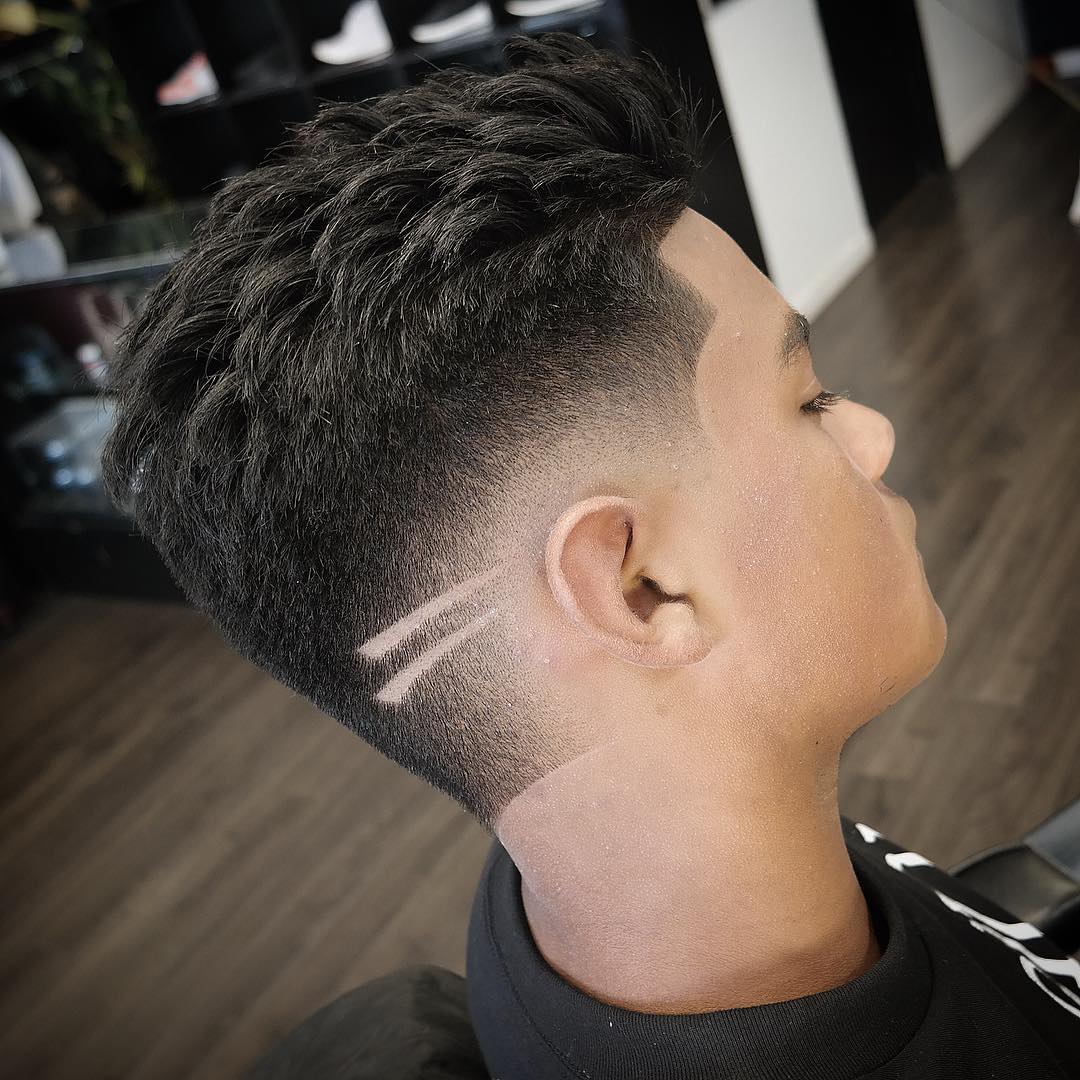 Burst fade with hair designs