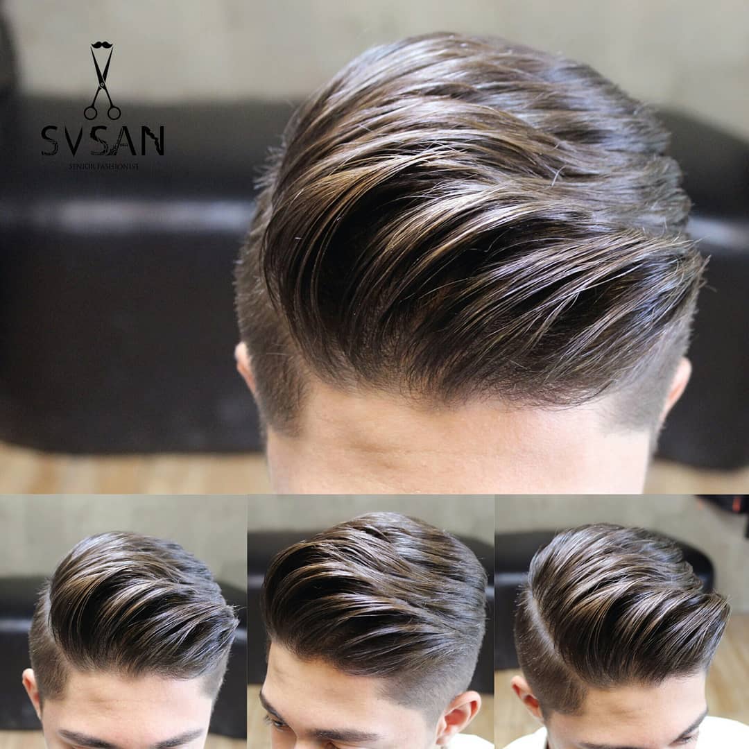 fade haircut with side part