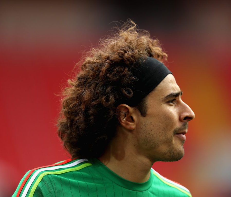 Football Player With Long Curly Hair