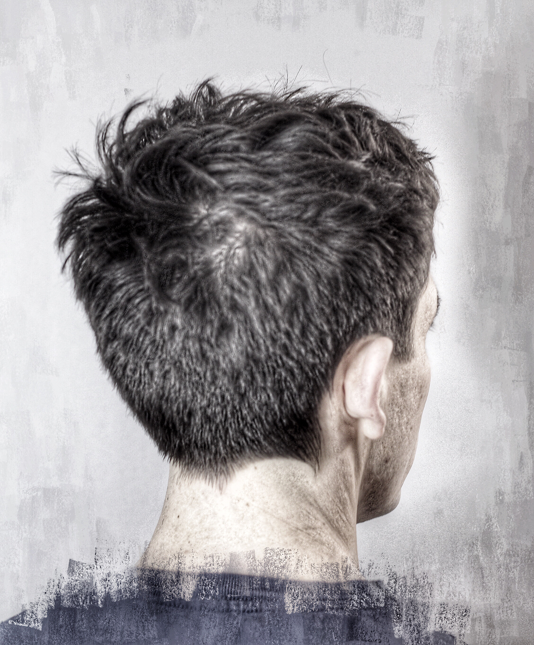 Diseño de cabello con cuello en V para cortes de cabello de hombres.