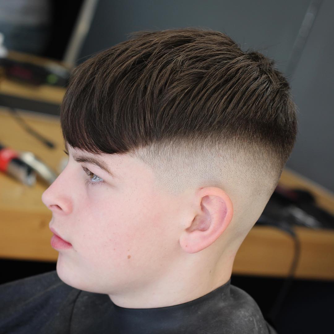 Crop with long fringe bald fade