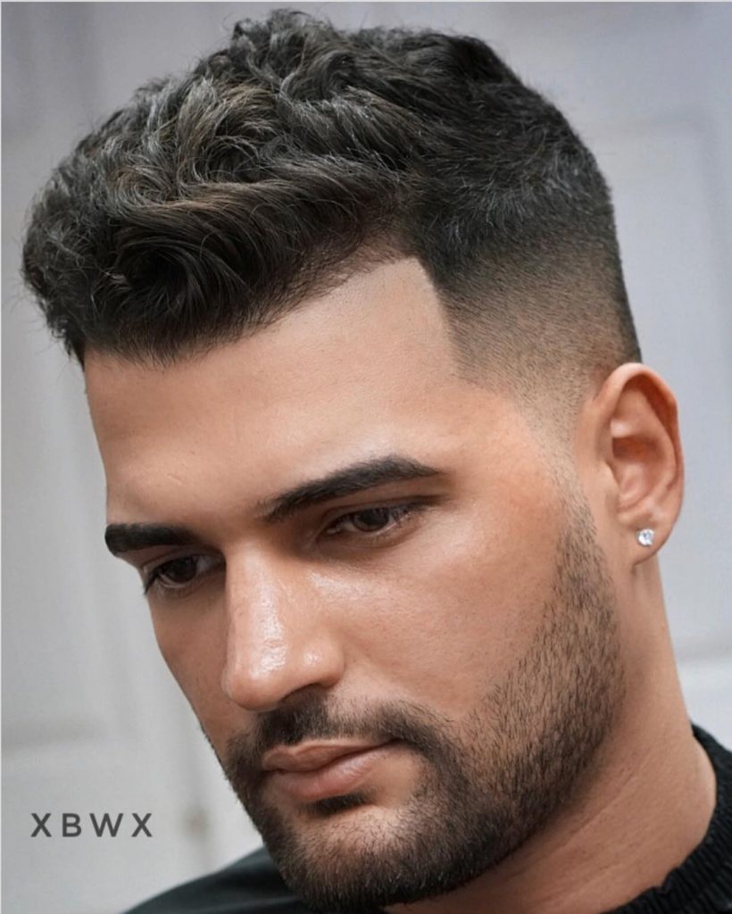 Premium Photo  Delighted bearded male surprised while creating new form of  his hairstyle time for new hairdo handsome young bearded man came to  barber for haircut hipster style concept of fashion