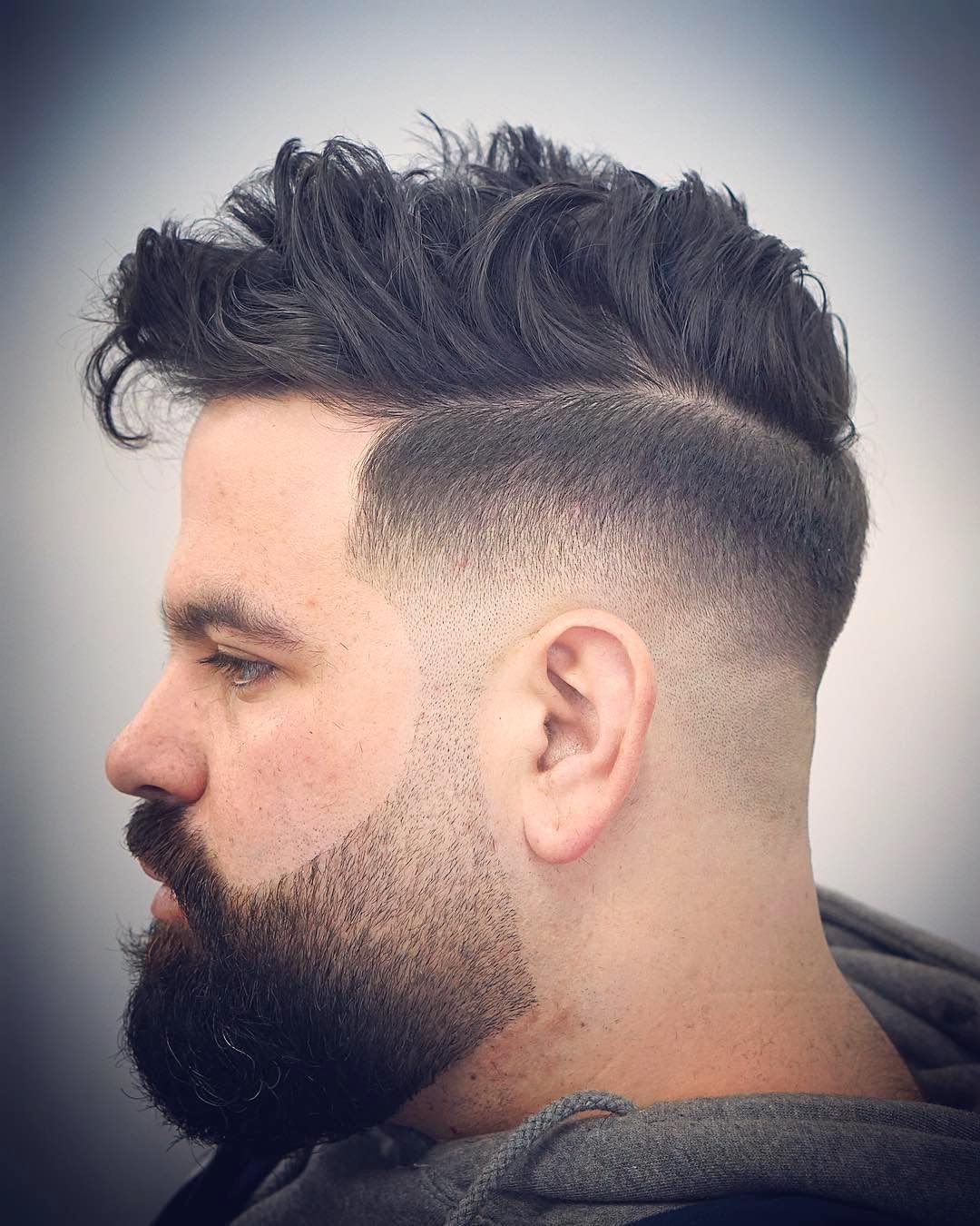 mikes_custom_kuts cool low fade peinado pelo largo y desordenado en la parte superior