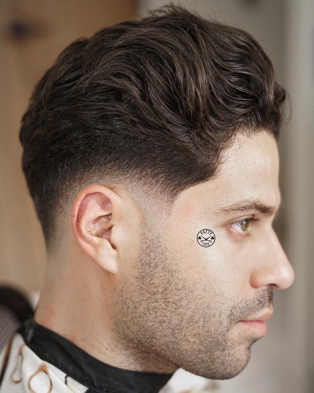 patty_cuts low fade haircut and medium mens hairstyle