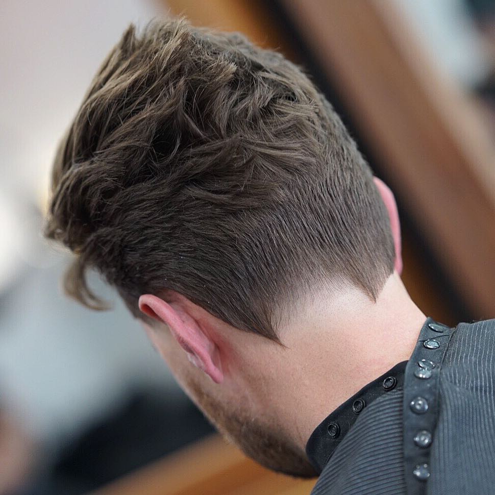 Messy faux hawk hairstyle for men