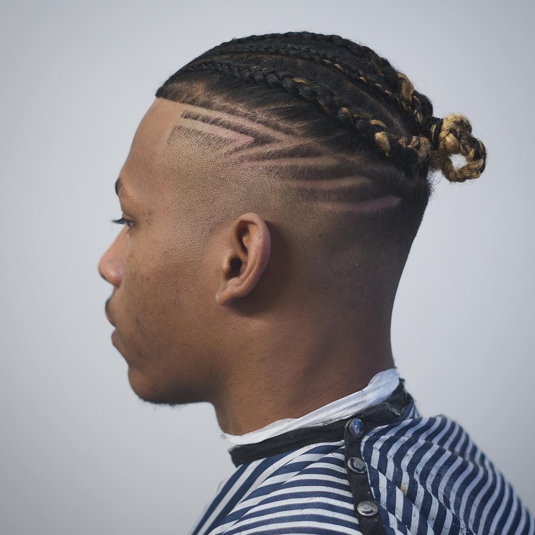 Corte de pelo desvanecido con trenzas