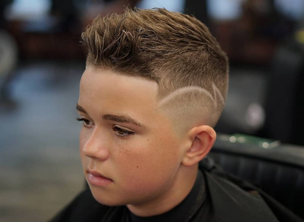 Boy In Barbers Chair Getting Hair Cut Closeup HighRes Stock Photo  Getty  Images