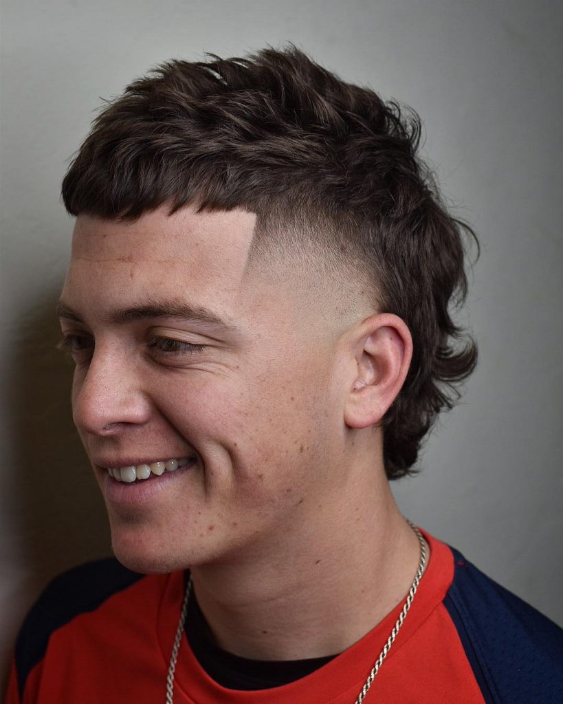 Mullet haircut with temp fade