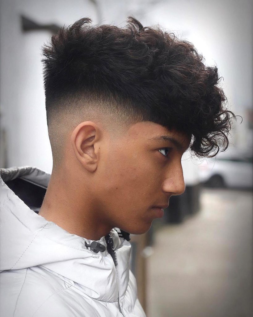 Fade haircut for curly hair men side fringe