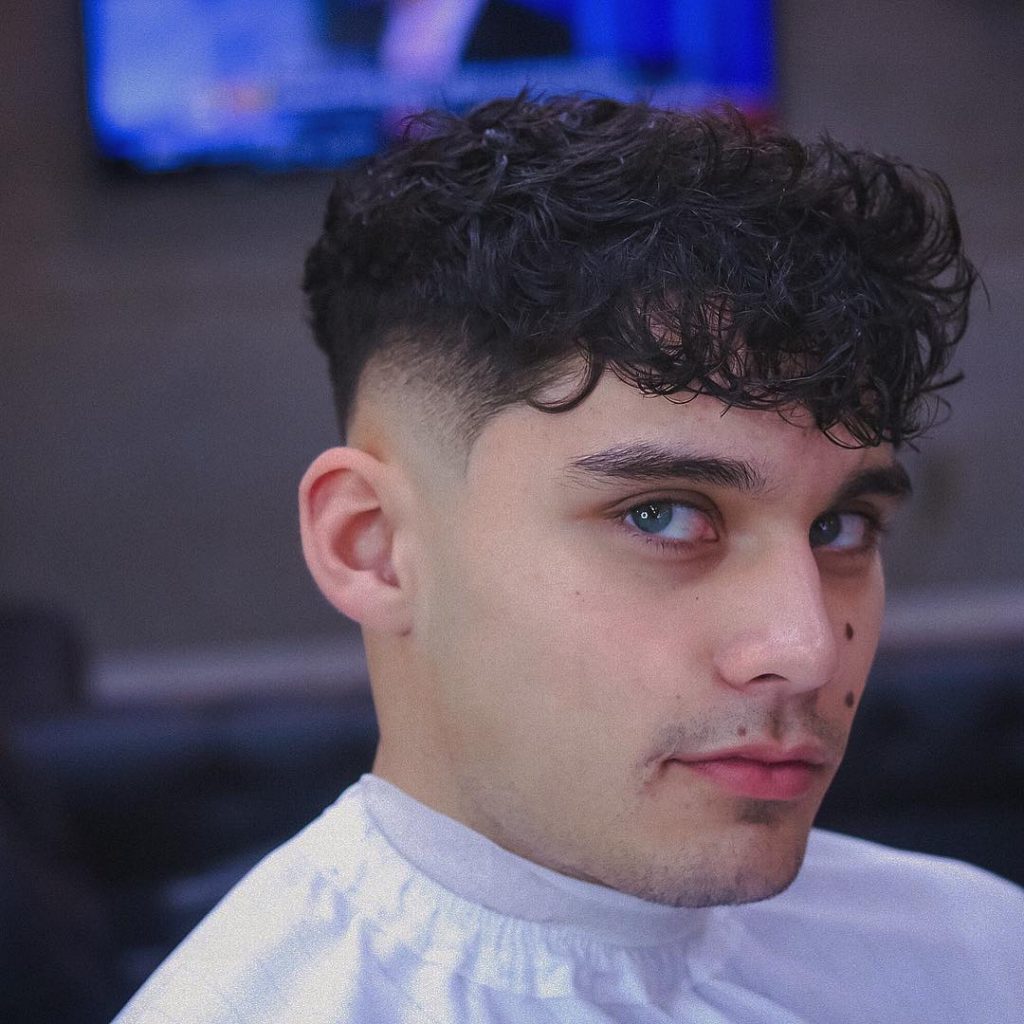 Curly fade haircut for men