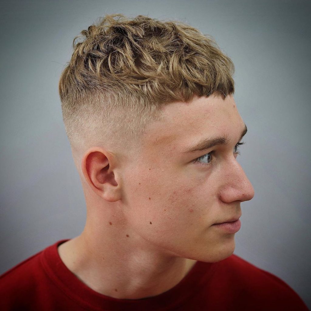 high curly fade haircut with short hair