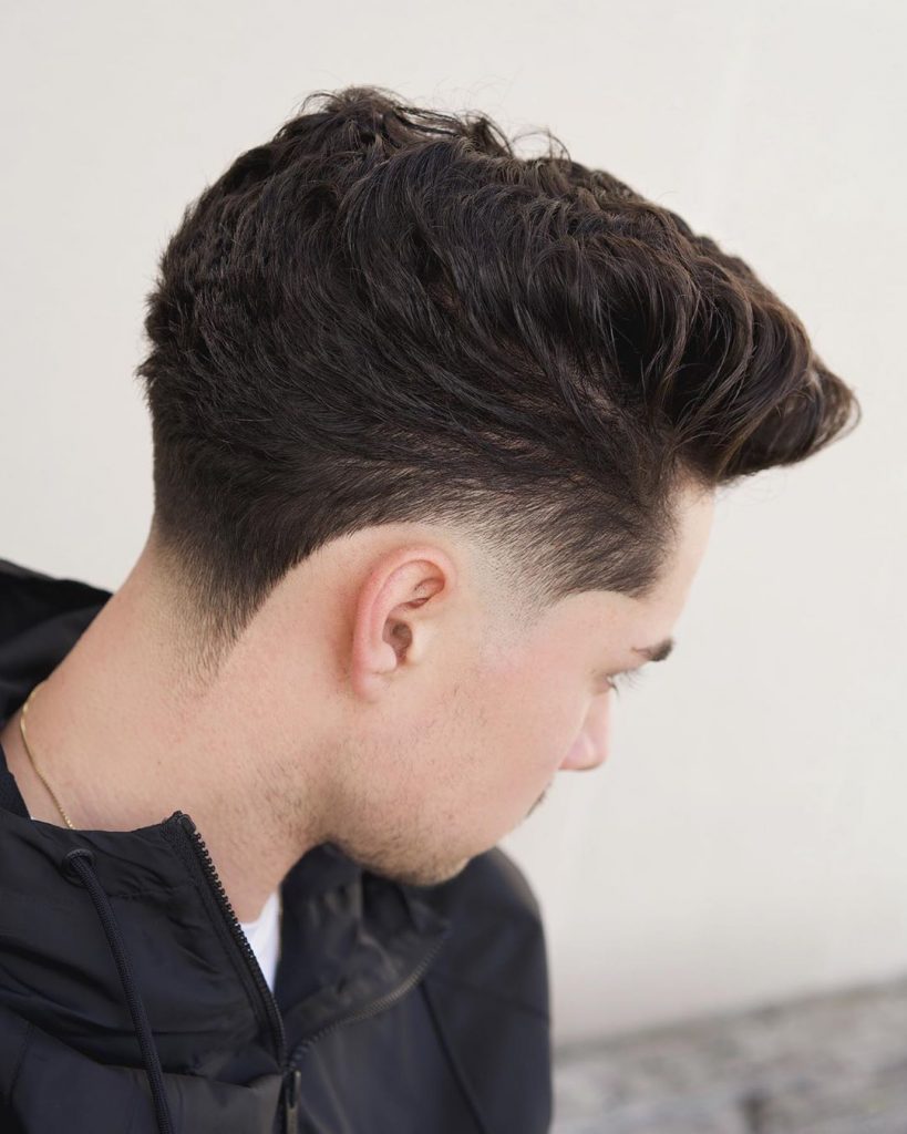 Fade haircut with taper