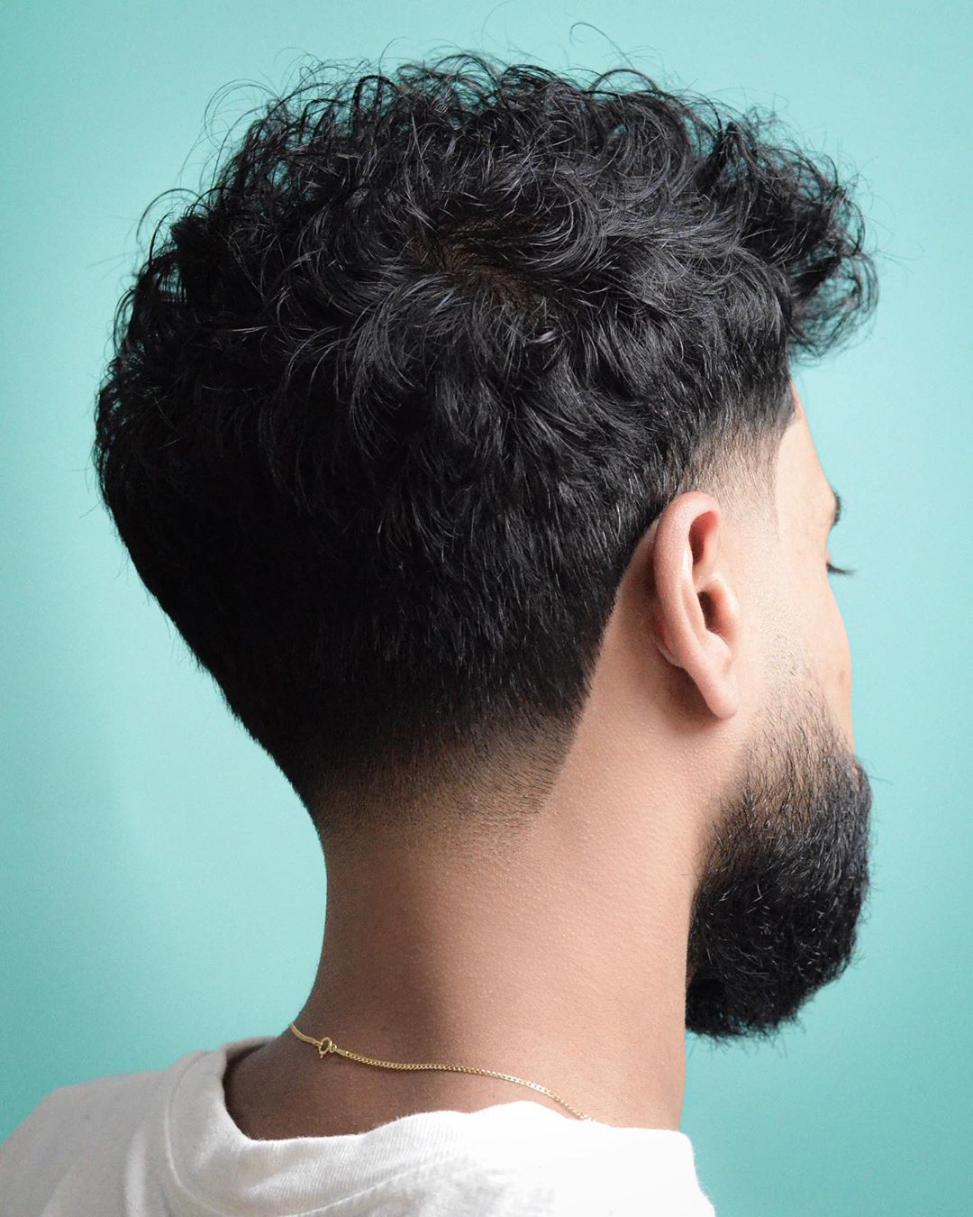 Curly taper fade + beard