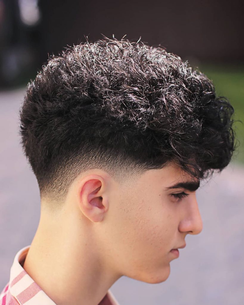 Curly hair with drop fade
