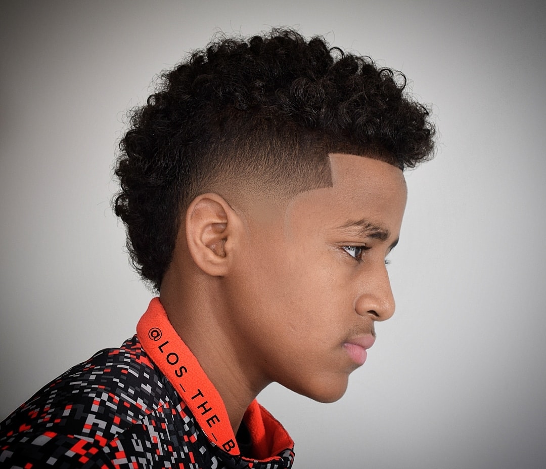 Black boy natural curls mohawk haircut