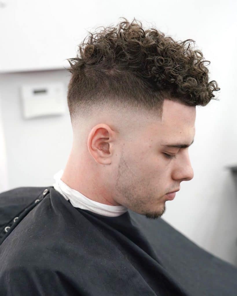 classic skin fade short curly hair