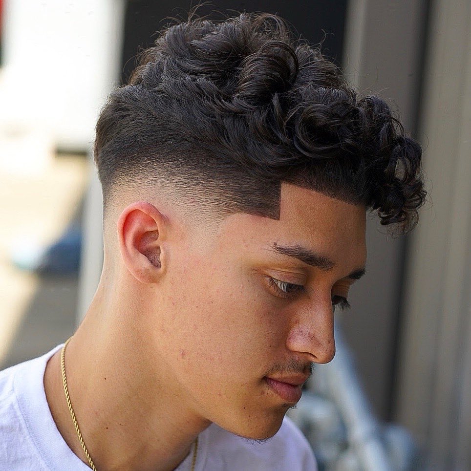 drop fade and curly hair