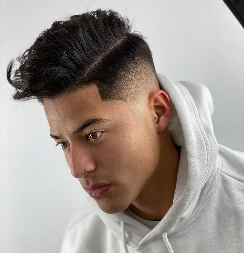 mid fade haircut with part