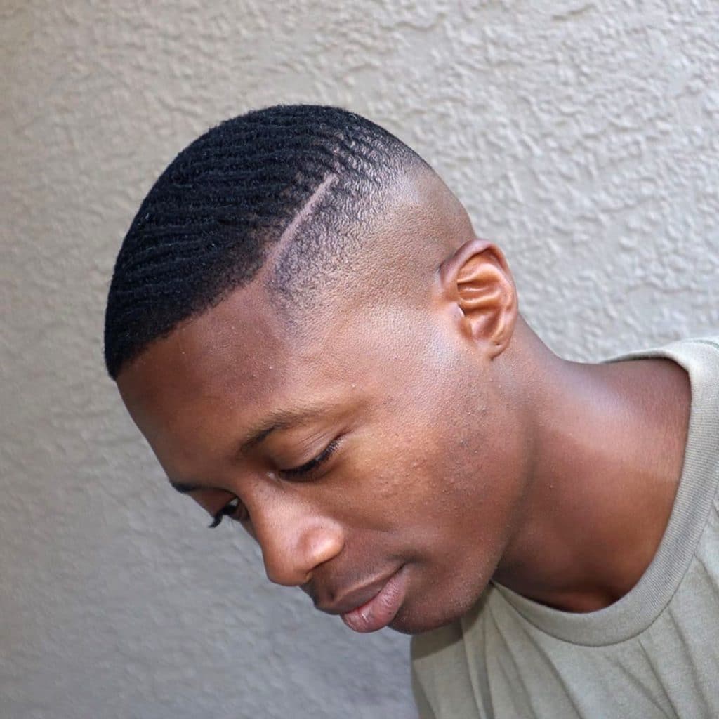 mid fade haircut with waves