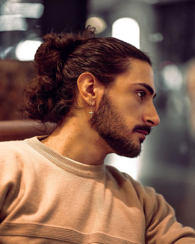 Curly hair man bun