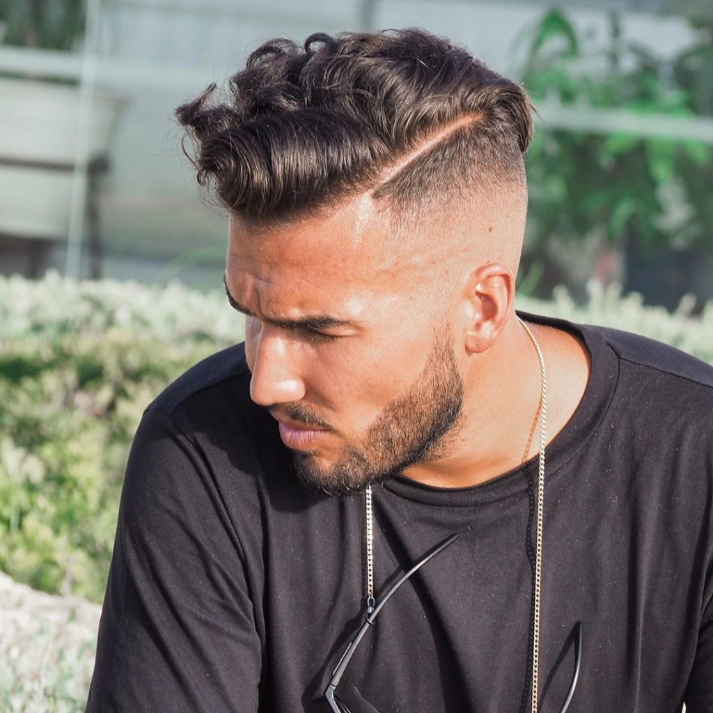 Wavy hair undercut for men