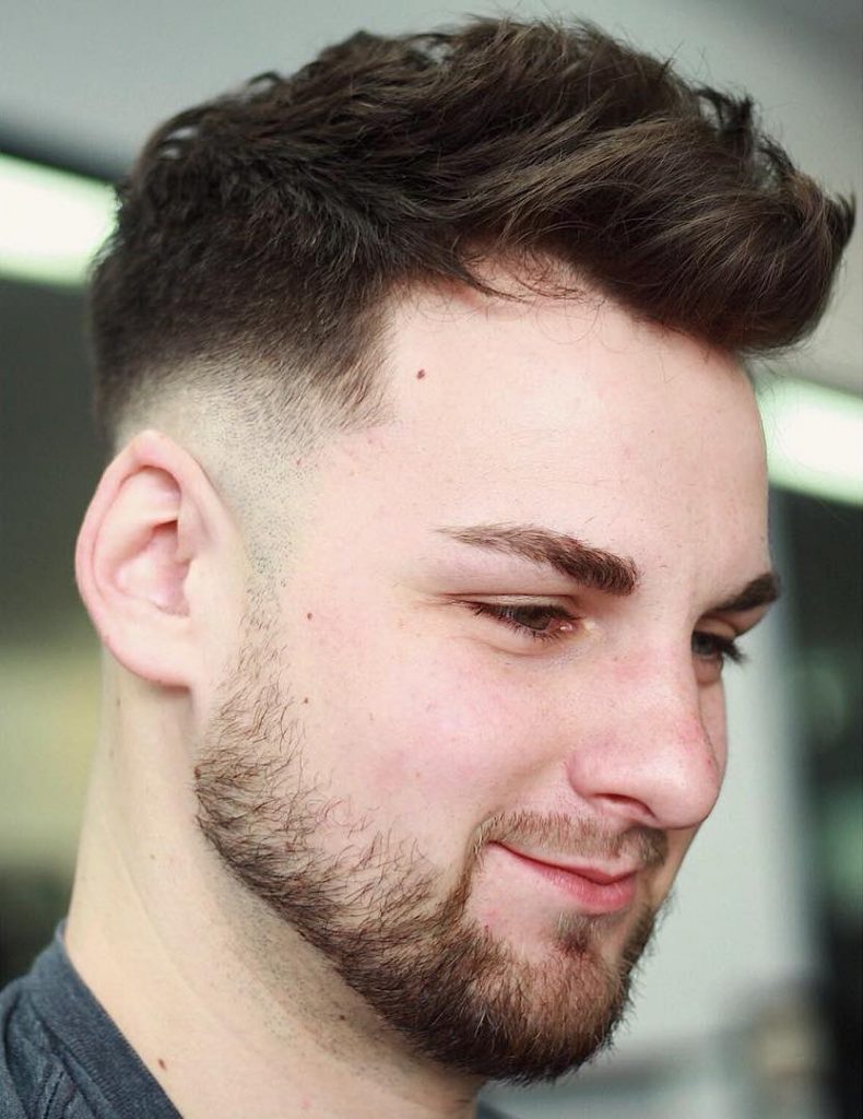 Longer top, short sides haircut for men